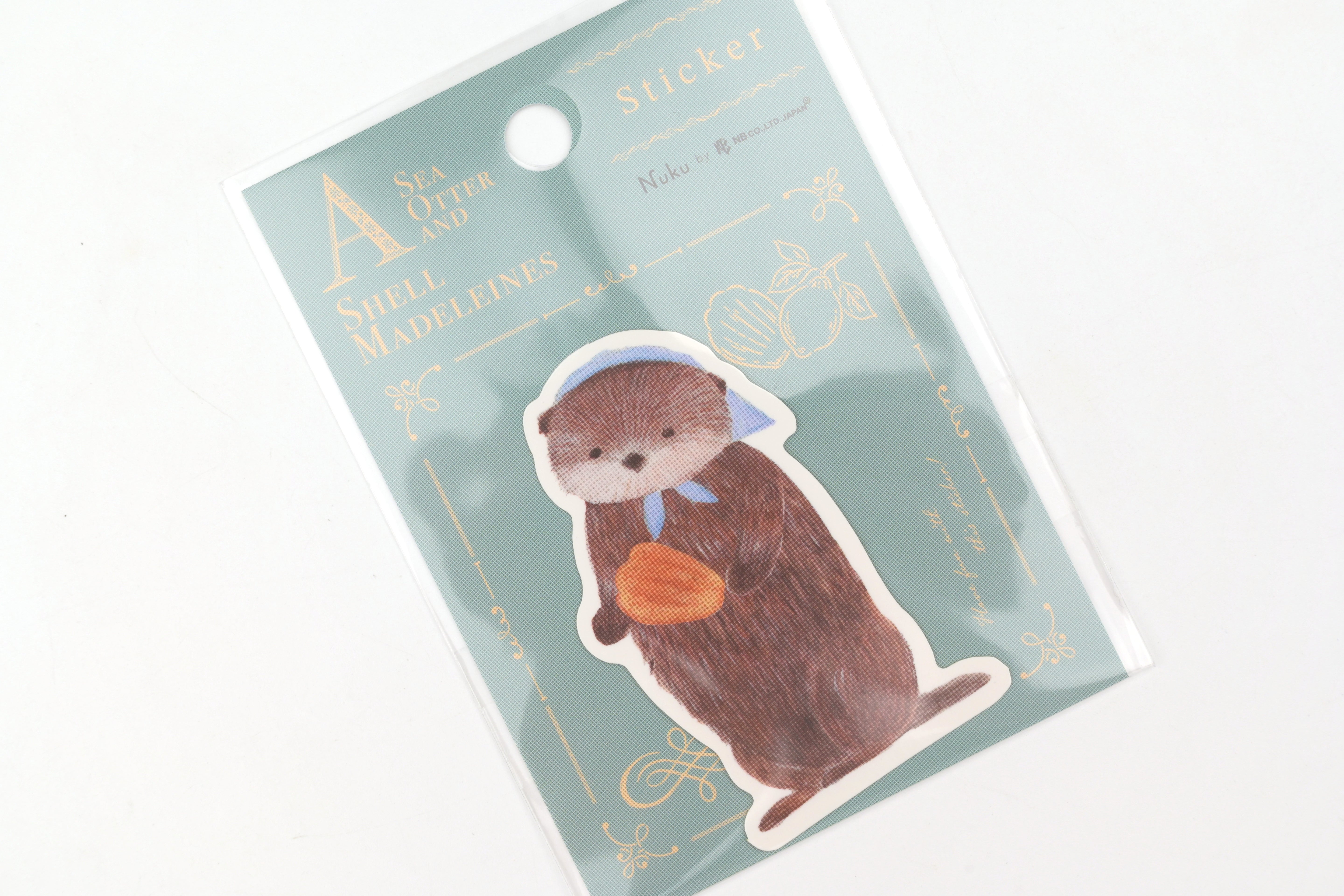 NB Die-cut Sticker - Ressa - A Sea Otter and Shell Madeleines