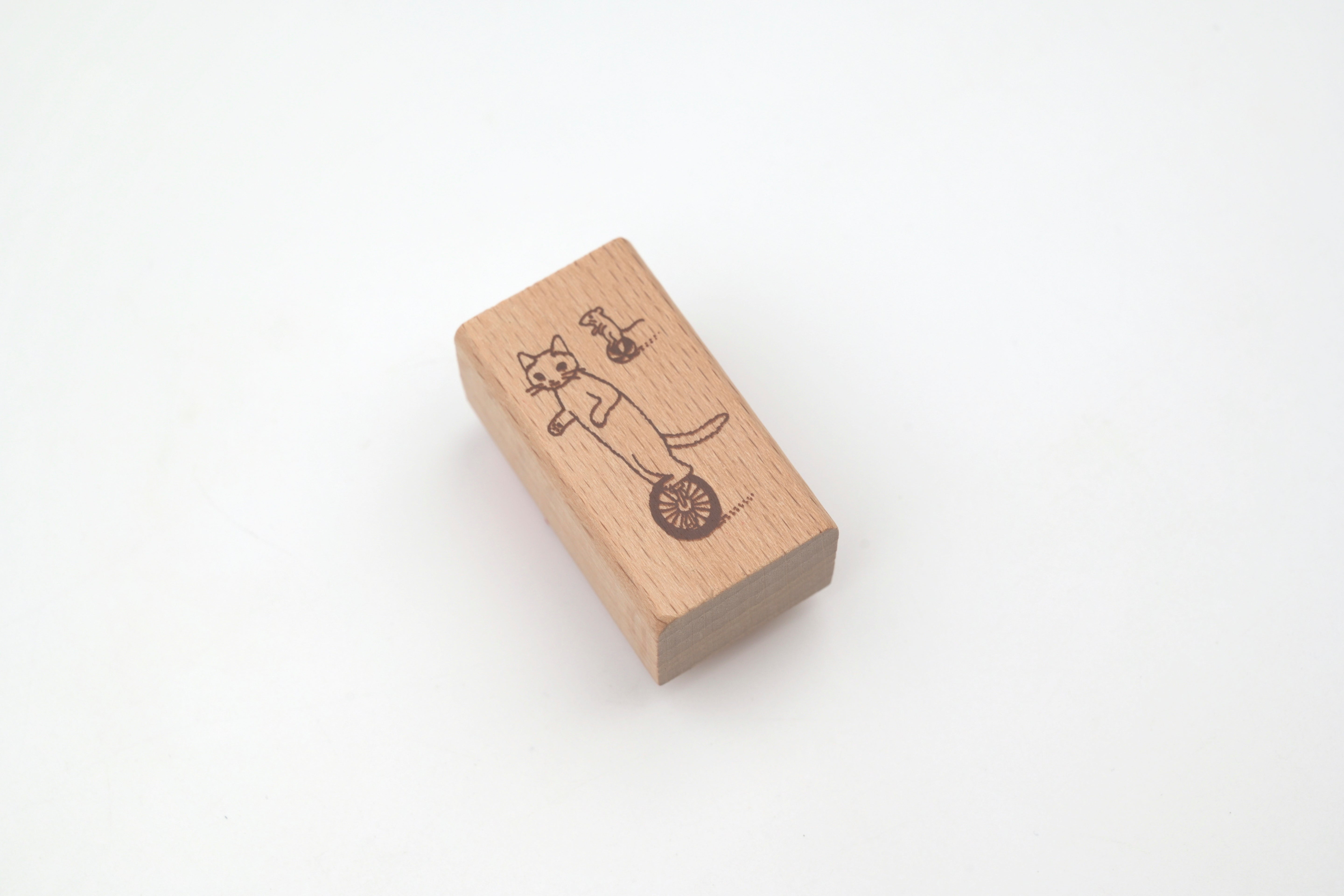 Pottering Cat Wooden Stamp - Large - Unicycle